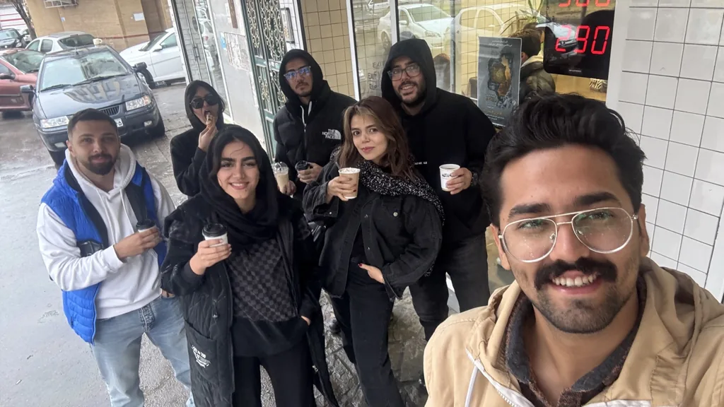The NoOr team on a coffee break in the street